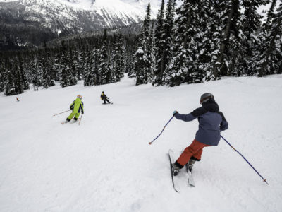 Family skiing with a Mountain Host in Whistler Blackcomb. Family skiing with a Mountain Host in Whistler Blackcomb.